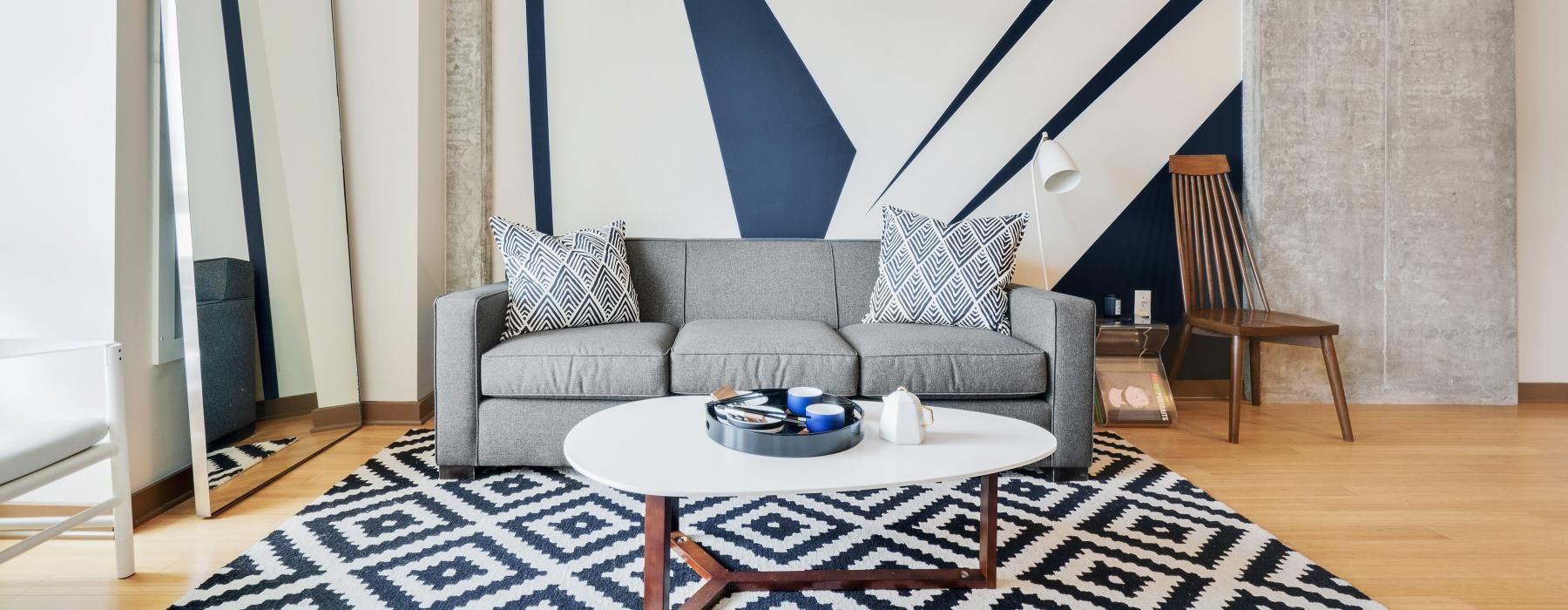 a living room with a couch and a coffee table