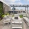a rooftop lounge and firepit area