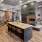 Spacious lounge with a fireplace and ample lighting