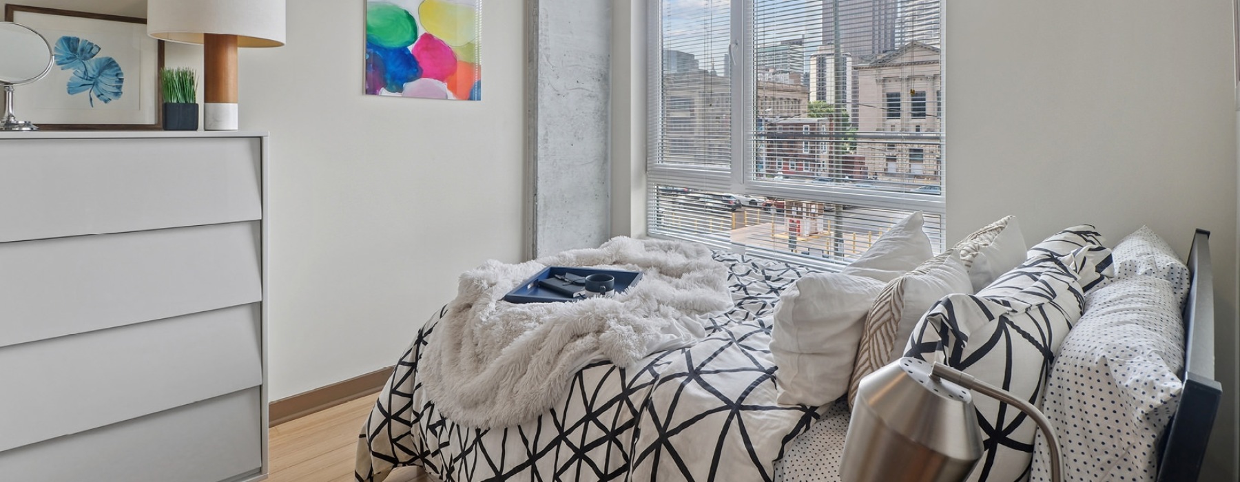 Bedroom with natural lighting and high ceilings