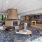 a large lounge with a fireplace