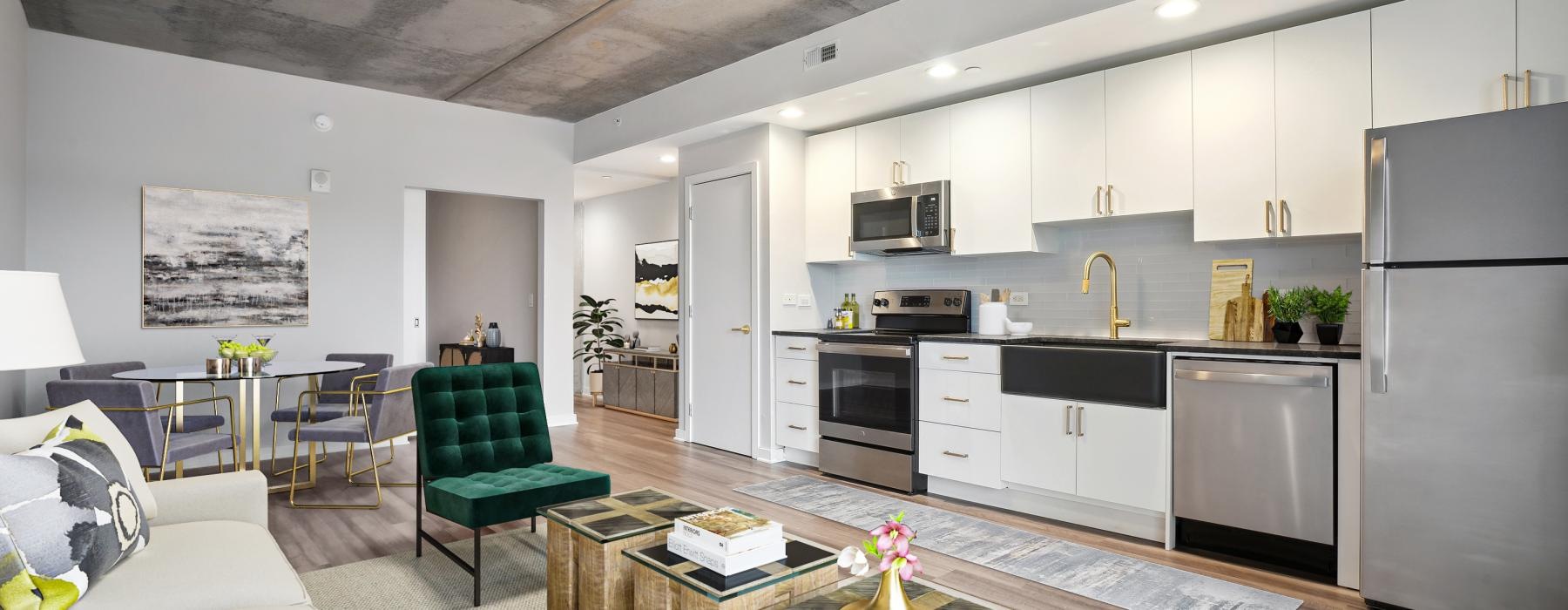 Open floor plan of living space, dining area, and kitchen at The Granary, the best apartments in Philadelphia